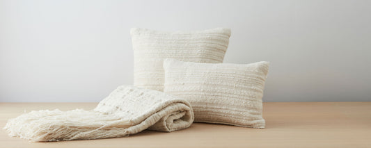 llama and boucle pillow collection