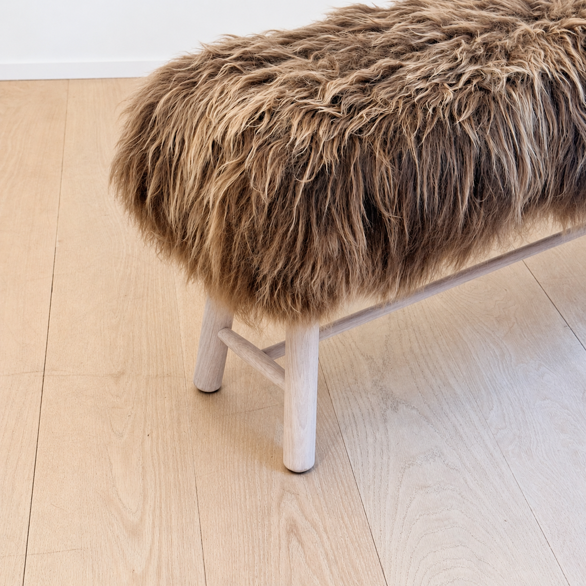 brown sheepskin bench
