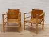 vintage pair of european campaign chairs