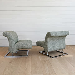 vintage pair of lounge chairs on chrome bases