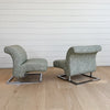 vintage pair of lounge chairs on chrome bases