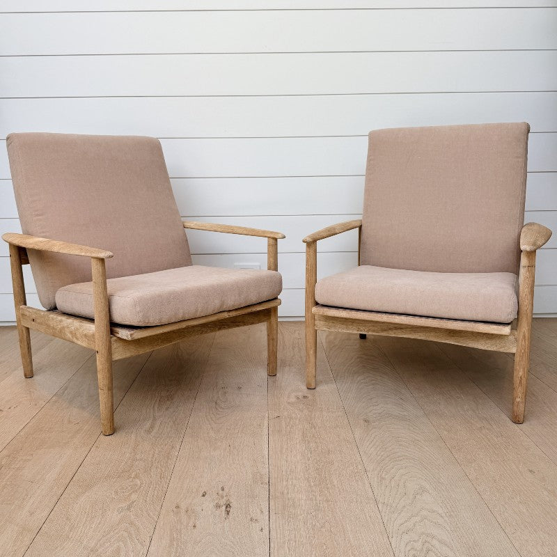 vintage pair of weathered oak armchairs