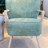vintage pair of olive armchairs