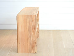 live edge waterfall console with shelf