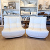 vintage pair of white leather armless chairs