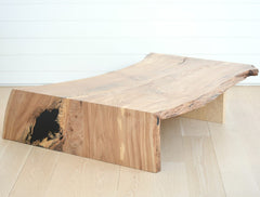 the walnut slab waterfall coffee table