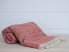 bell natural and pink throw