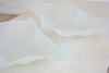 white glass centerpiece long