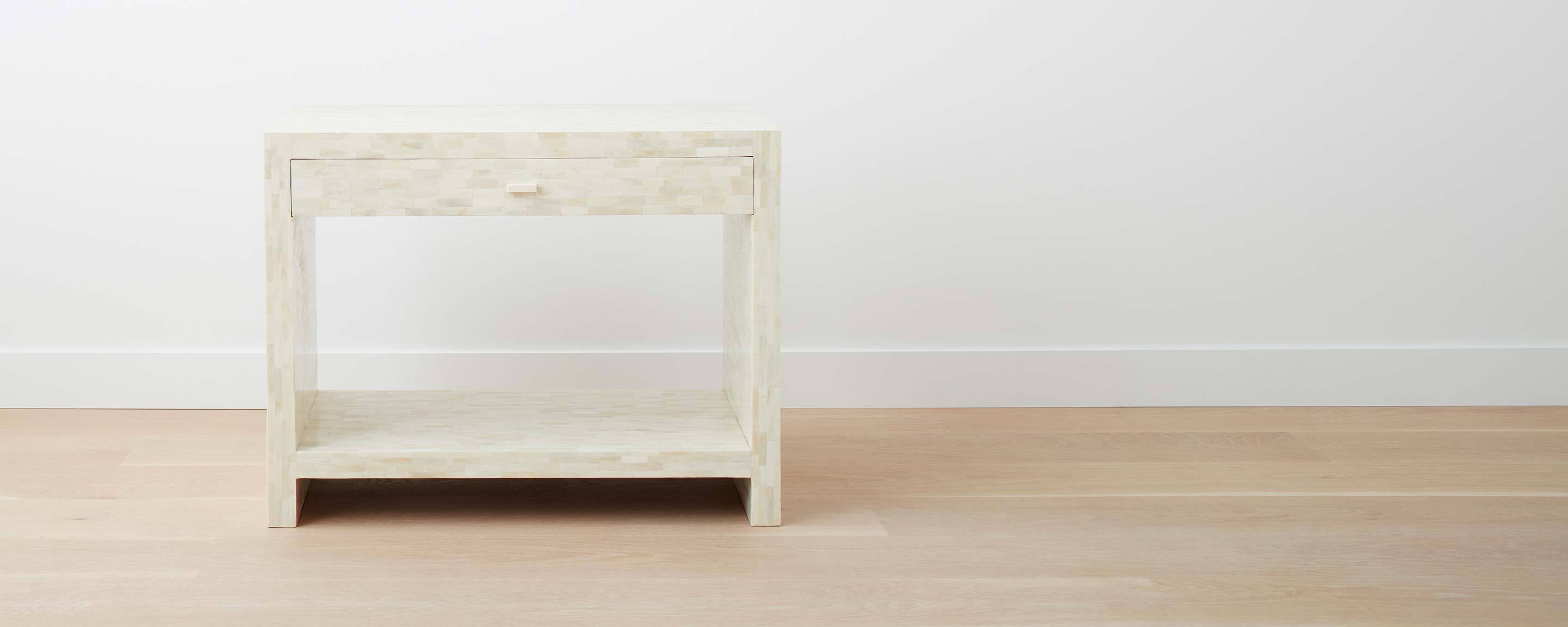 the white bone wide end table with drawer