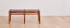 the woven teak and leather bench
