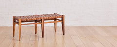 the woven teak and leather bench