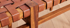 the woven teak and leather bench