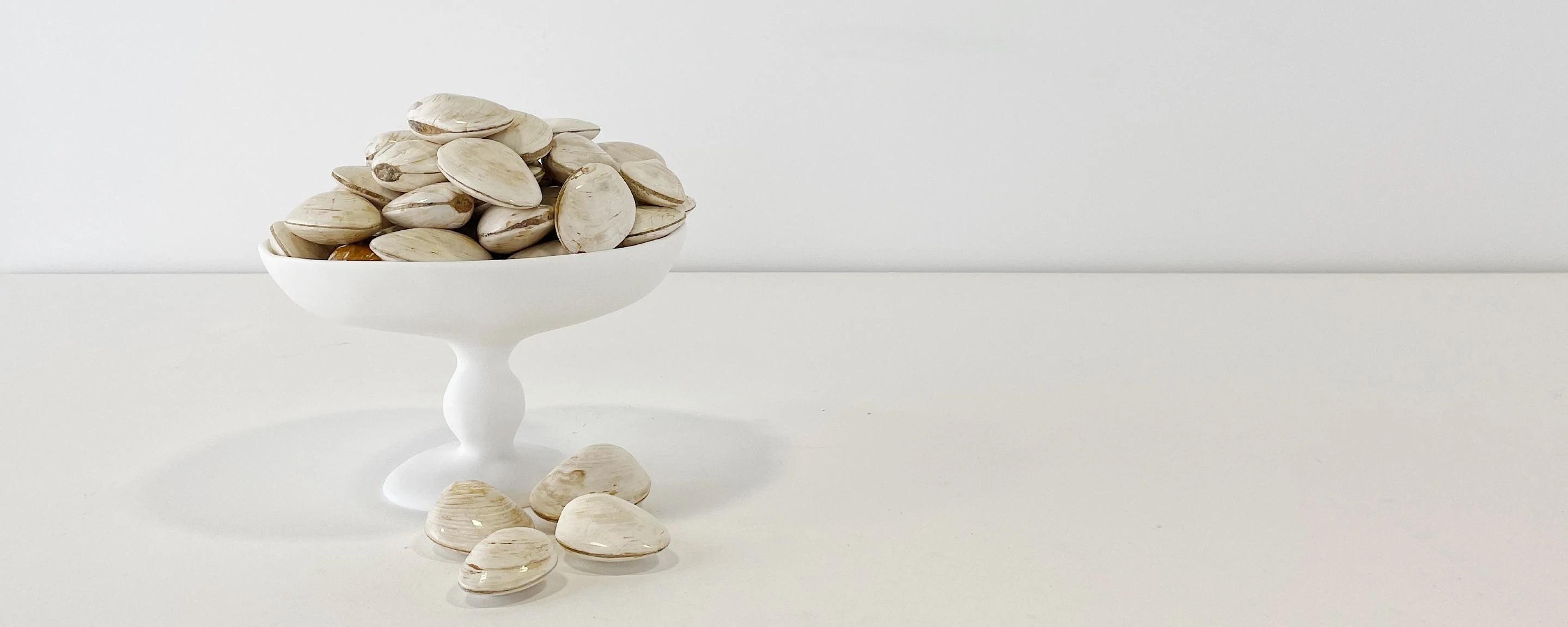 resin pedestal white bowl by tina frey