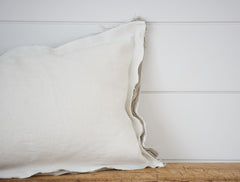 raw edges oyster and taupe lumbar pillow