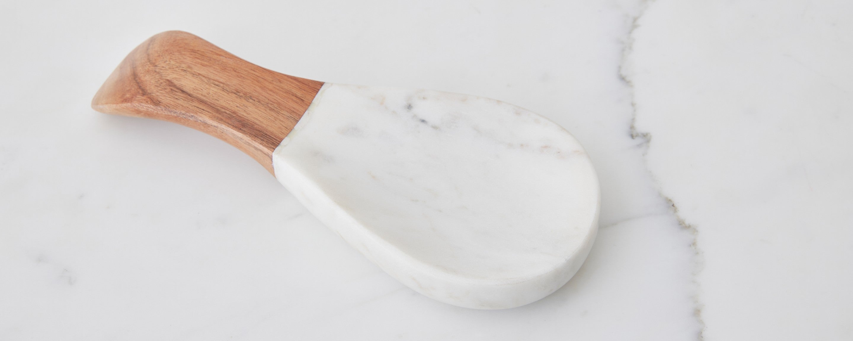 marble and acacia wood spoon rest