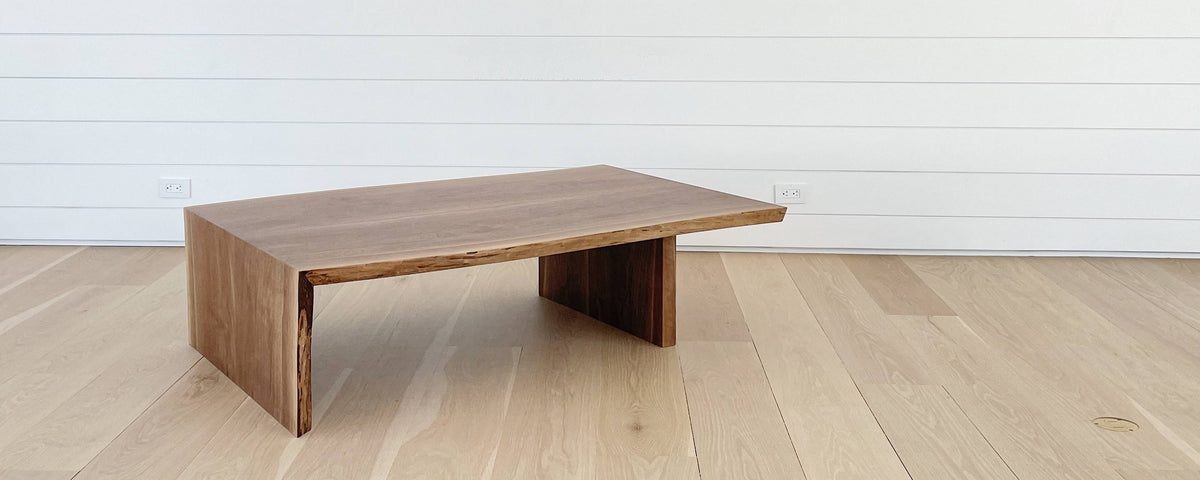 the walnut slab waterfall coffee table