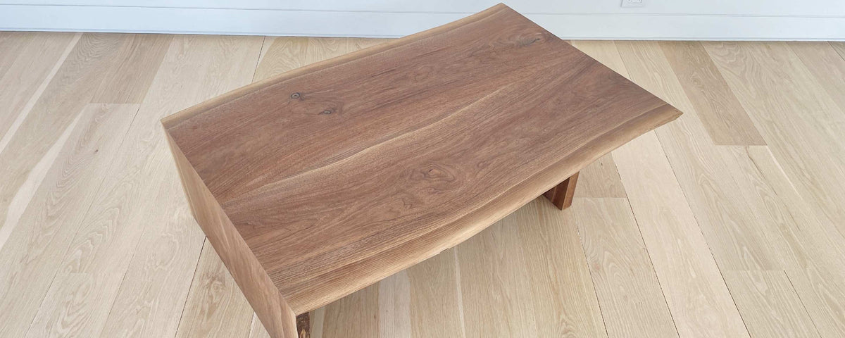 the walnut slab waterfall coffee table
