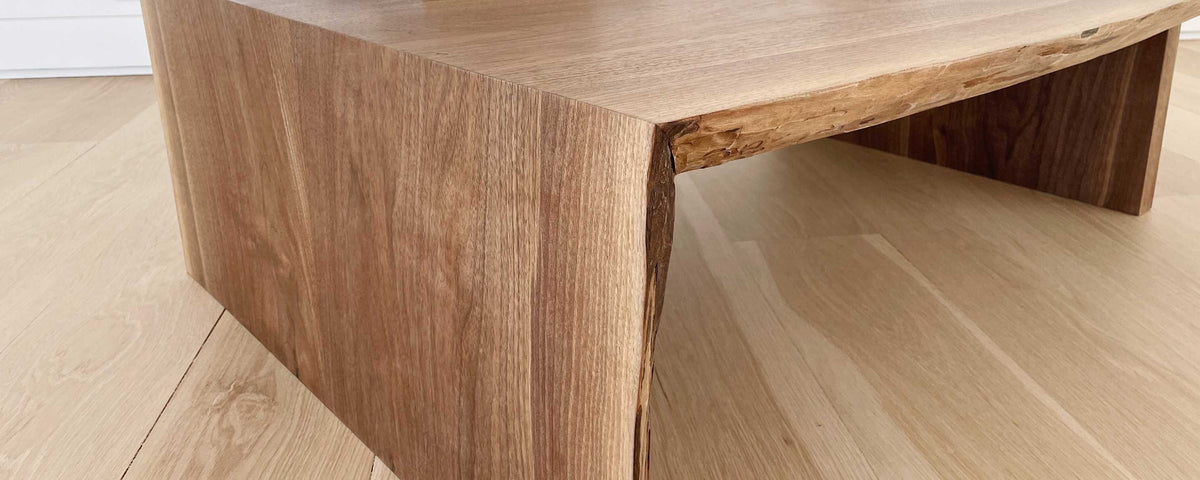 the walnut slab waterfall coffee table