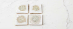 set of white glazed crackle coasters